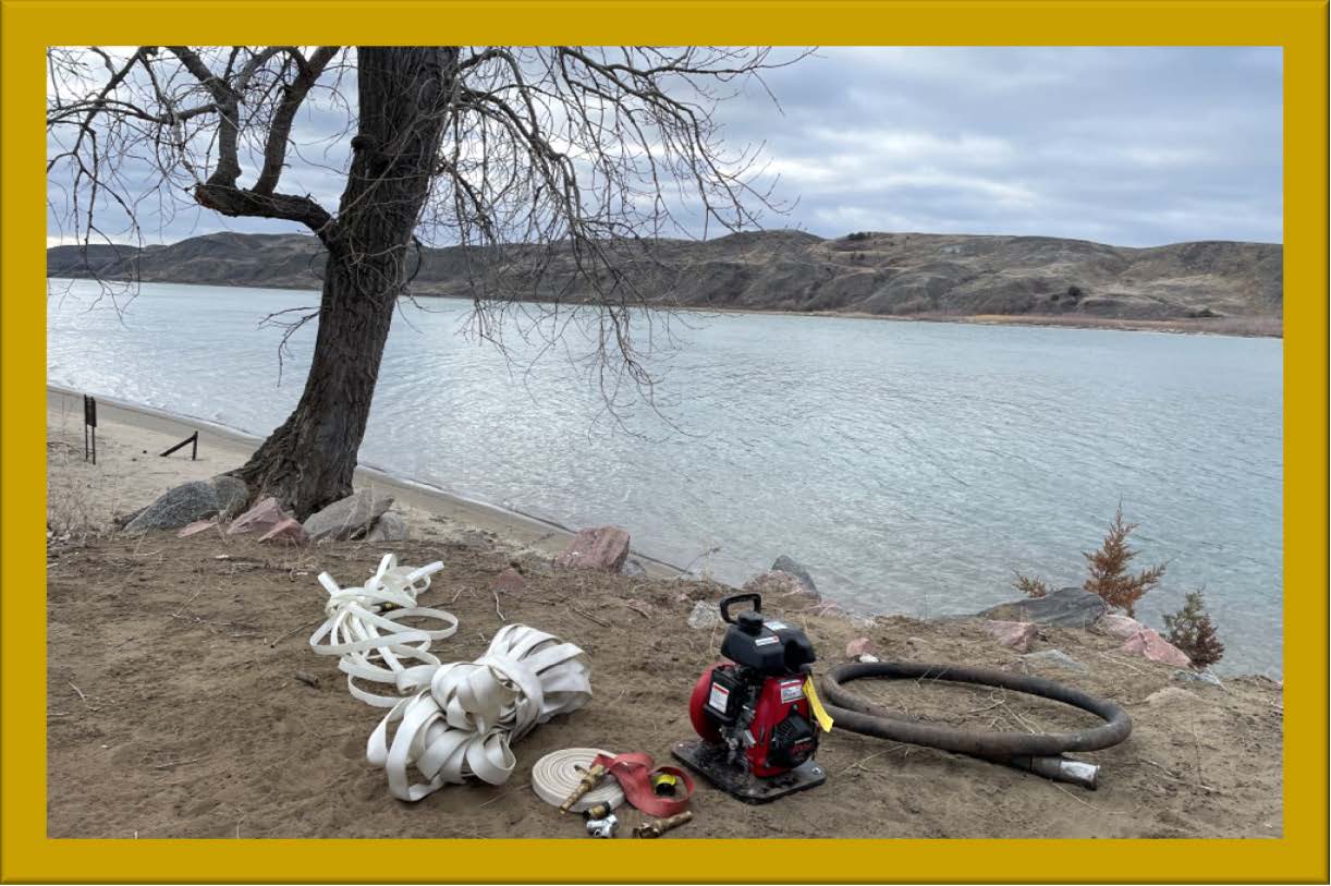image of wildfire academy training equipment on shore next to a lake