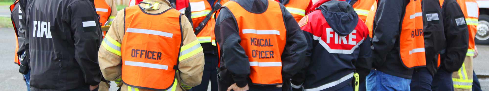 Image of first responders gathered together at a scene