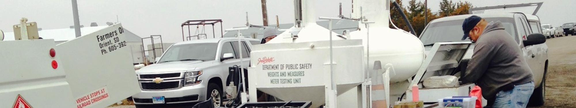Image of Inspector preparing to conduct operations with fuel prover equipment