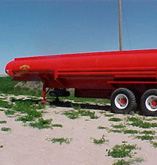 Image of red 5th wheel hitch tanker