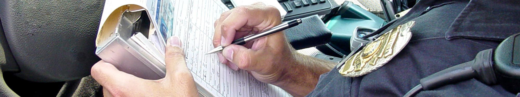 Image of Officer writing a citation